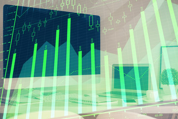 Forex Chart hologram on table with computer background. Double exposure. Concept of financial markets.