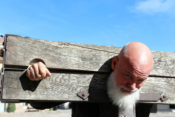 Man in pillory, Fredrikstad, Norway - obrazy, fototapety, plakaty