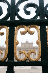 view through the gate of the Royal Palace of Madrid -spain - travel destination - tourist attraction.