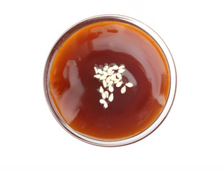 a bowl of teriyaki sauce and sesame seeds