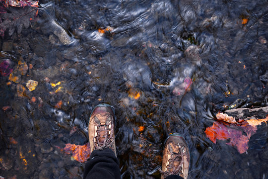 Waterproof hking boots in a stream