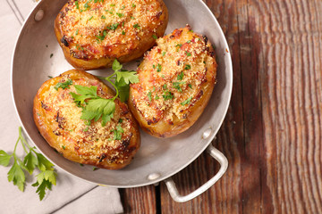 baked potato with cream and herbs