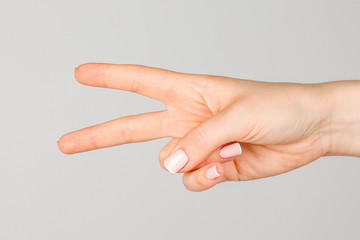 Female hand on white background.