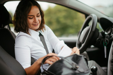 Young woman in car