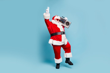 Full length body size view of his he nice cool fat bearded Santa clubber carrying tape player dancing having fun clubbing nightclub isolated over blue turquoise pastel color background