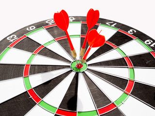 Target with three red dart focus on bull's eye, Setting challenging business goals And ready to...