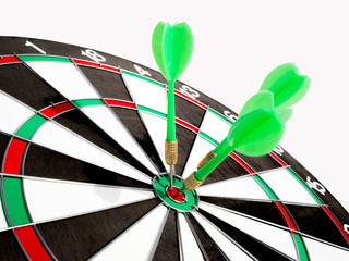 Target with three green dart focus on bull's eye, Setting challenging business goals And ready to...