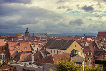 Fototapeta premium Traditional buildings and rooftops in the historic old town of Bamberg, a medieval city in Upper Franconia, Germany. Famous travel, tourism destination