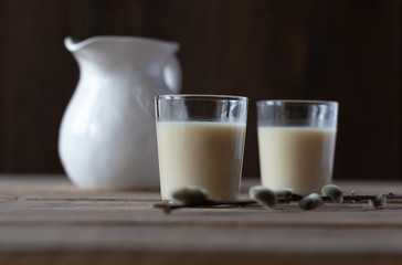 Oat milk in glasses. Alternative dairy-free vegan-friendly plant milk