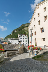 Fototapeta na wymiar picturesque mountain village with white stone houses and stone roofs in the Swiss Alps