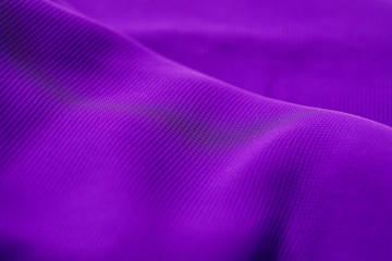 texture of the satin fabric of lilac color for the background.