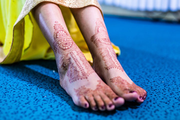 Indian hindu's bride pre wedding henna mehendi mehndi feet close up