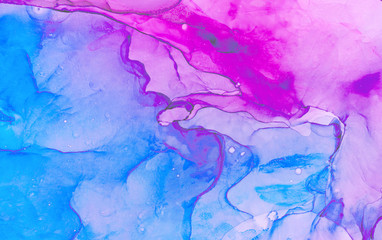Trendy fantasy light blue, pink and purple alcohol ink abstract background. Bright liquid watercolor paint splash texture effect illustration for card design, banners, modern graphic design