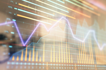 Stock market chart with trading desk bank office interior on background. Double exposure. Concept of financial analysis