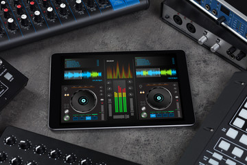 Mixing music on tablet with electronic music instruments concept