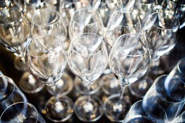 Large number of glass glasses on buffet table