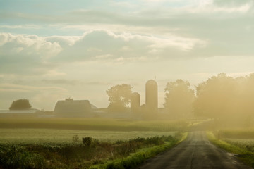 Naklejka na ściany i meble Farm Silhouette in Morning Fog