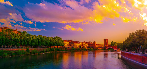Fototapeta premium Panoramic view to Bridge Ponte Pietra in Verona on Adige river. Veneto region. Italy.