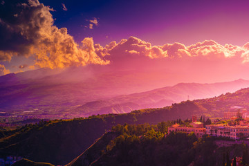 A panoramic view of Taormina, Giardini Naxos and Mount Etna, in Sicily, Italy.