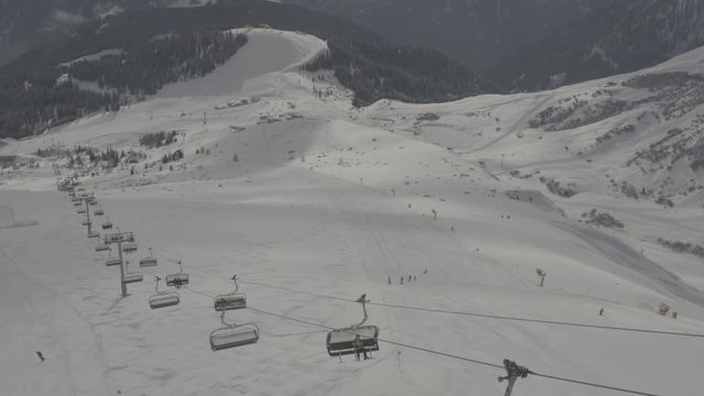 busy ski area chairlift serfaus winter mountains
