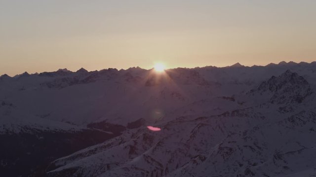 lpine sunset above silvretta mountains more lens flare