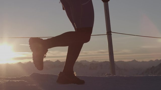 man running on mountain ridge in alpine sunset kaunertal silvretta