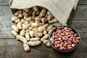 inshell peanuts sprinkled on a table