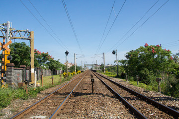 Fototapeta na wymiar Train tracks with blue sky in Taiwan.
