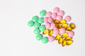 colorful pills on white background