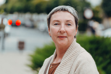 Smiling old woman portrait. anti aging concept. Portrait of a beautiful senior woman