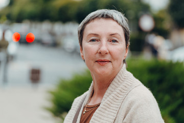 Smiling old woman portrait. anti aging concept. Portrait of a beautiful senior woman