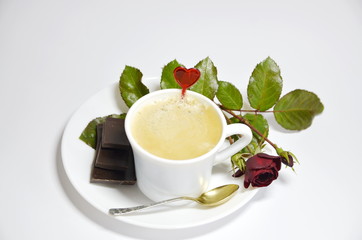 Valentine's Day. Postcard cup of coffee, red rose, black chocolate dessert.