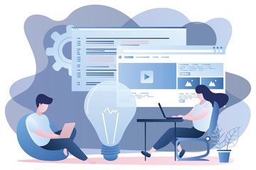 Male and female programmers with laptops at workplace,front-end and back-end development.