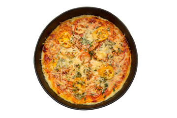 Pizza cooked at home. Baked in an iron pan. Isolated on a white background.