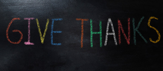 handwriting with colorful chalk give thanks