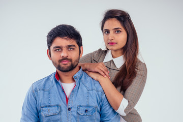 indian couple in love posing at studio white background