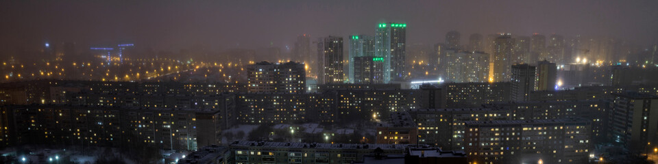 Fototapeta na wymiar nightclub city in fog panorama