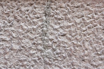relief plastered surface with a crack