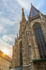 Fototapeta na wymiar St. Stephen's Cathedral in the background a sunset and blue sky in Vienna