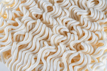 macro texture background of instant noodles which main ingredient from wheat, close up view