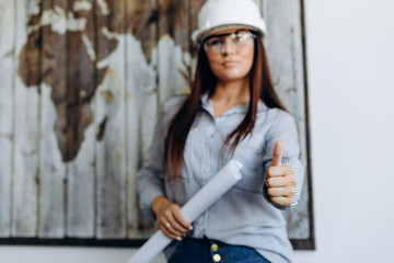 A beautiful woman showing thumbs up