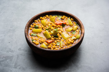 Lauki / Doodhi Chana Dal Subji or Bottlegourd Gram Curry, served in a bowl.selective focus