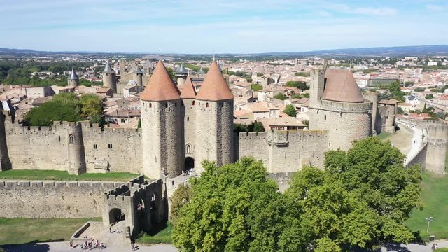 Aerial top view of Carcassonne medieval city and fortress castle from above, Sourthern France