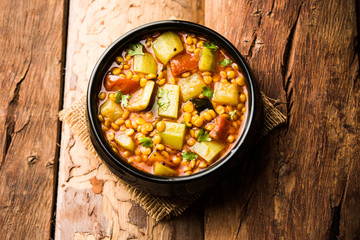 Lauki / Doodhi Chana Dal Subji or Bottlegourd Gram Curry, served in a bowl.selective focus