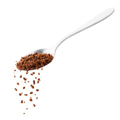 Instant coffee spills from a spoon on a white. Isolated