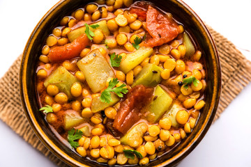Lauki / Doodhi Chana Dal Subji or Bottlegourd Gram Curry, served in a bowl.selective focus
