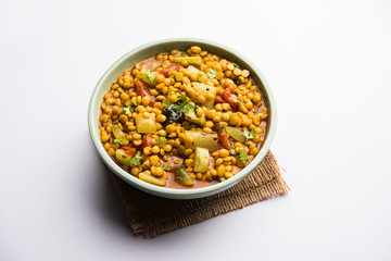 Lauki / Doodhi Chana Dal Subji or Bottlegourd Gram Curry, served in a bowl.selective focus