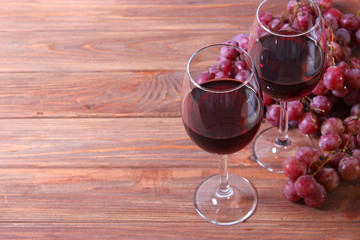 red wine and grapes on the table top view.