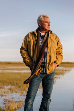 Lifestyle Image of Senior Man on Vacation in Autumn