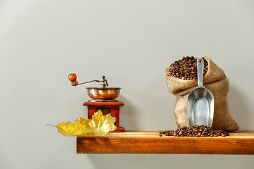 Fresh coffee on wooden shelf and free space for your decoration. 